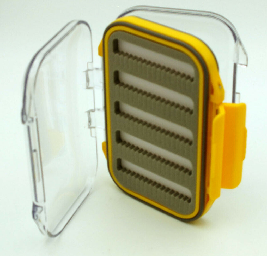 Empty waterproof fly box with clear lid and slotted foam rows
